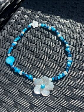 Blue Beaded Necklace with Mother-of-Pearl Flower Pendant